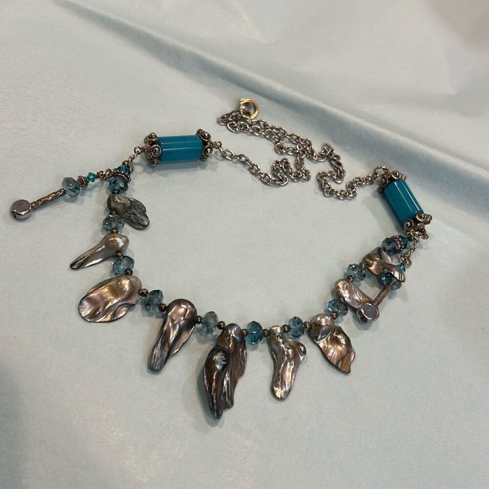 #2 Faux abalone, on a 24”  silver tone chain, with aqua faceted beads.